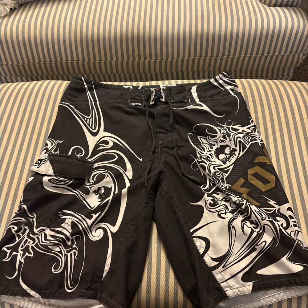 Y2K Deluxe Fox Men's Black and Gold Swim Shorts